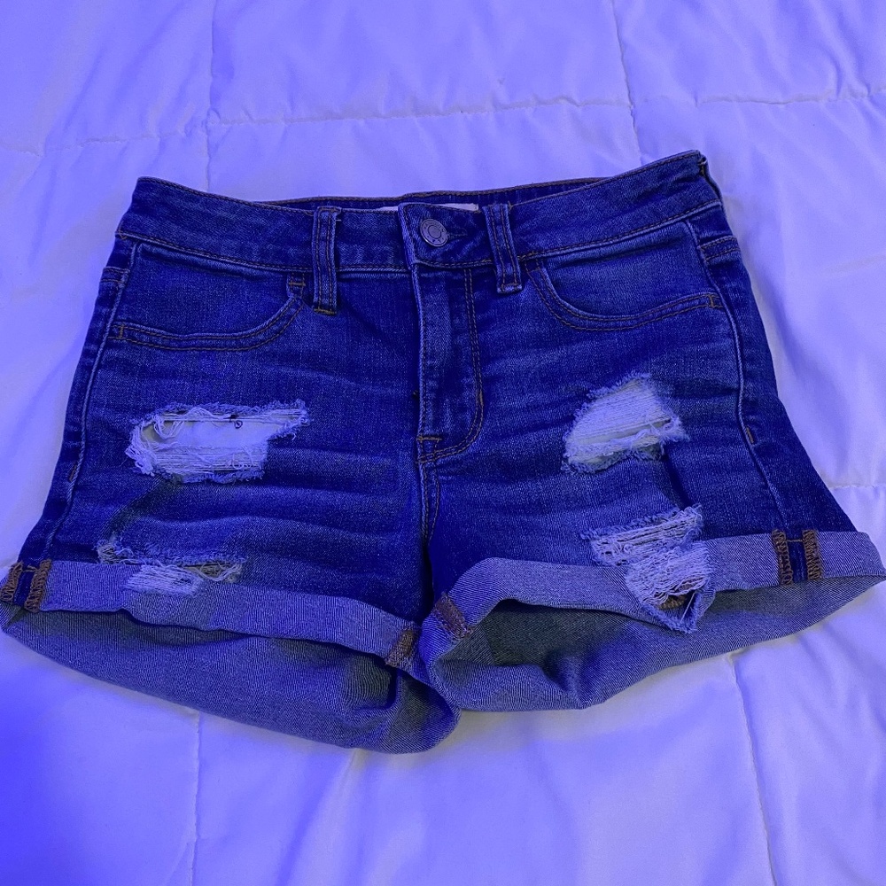 Woman Ripped Jean Shorts